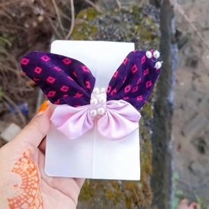 Butterfly bow with aligater clips